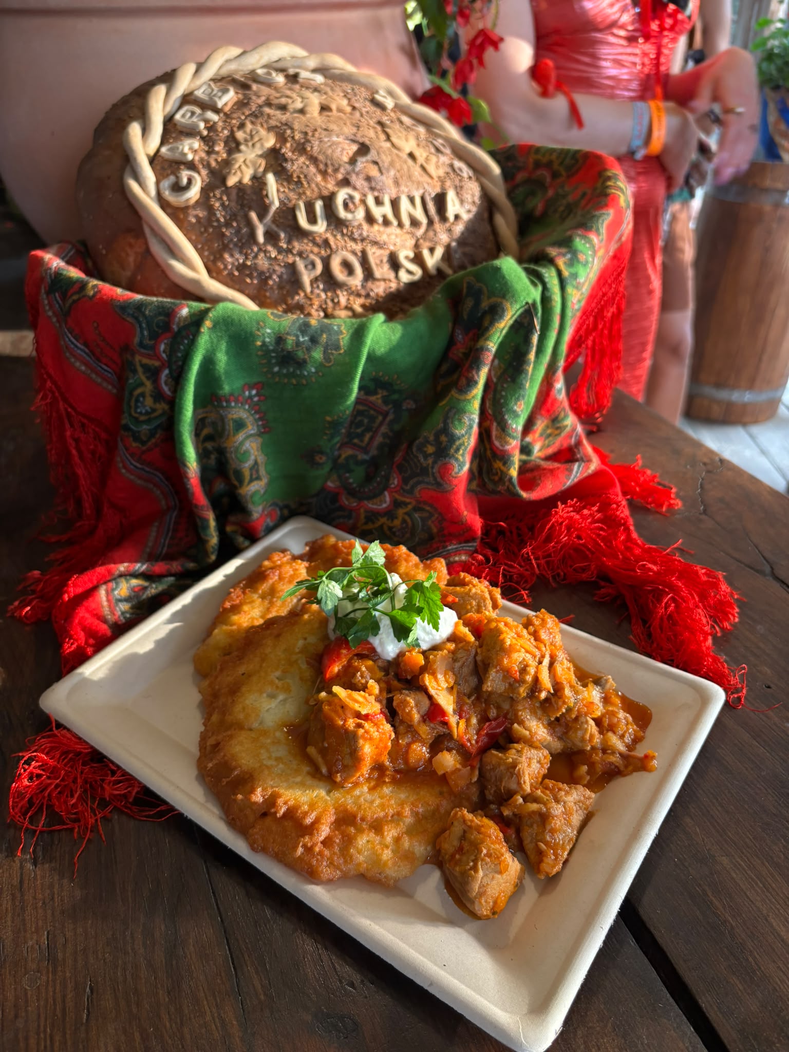 Potato pancakes topped with goulash and sour cream at Kuchnia Polska