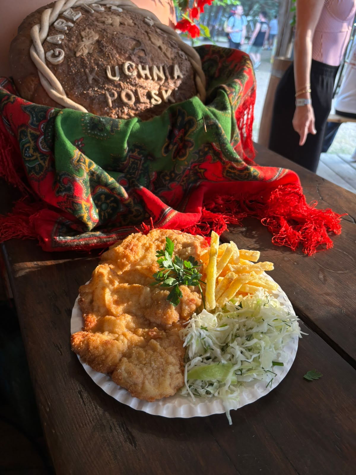 Polish pork schnitzel served with fries and fresh cabbage salad at Kuchnia Polska