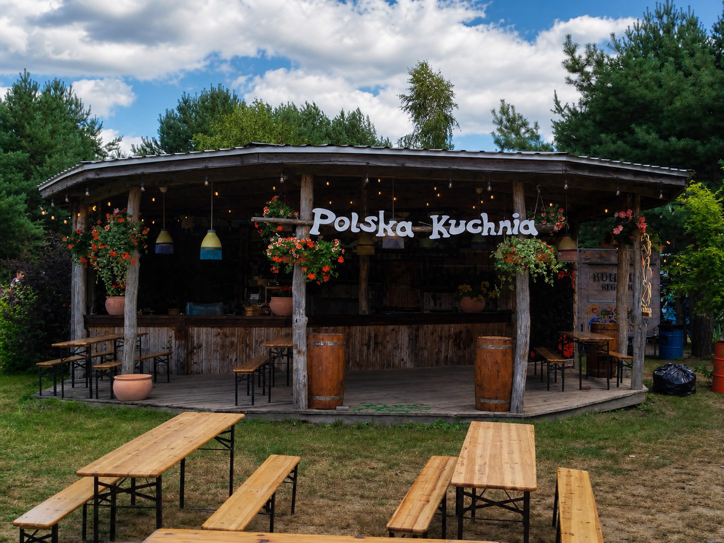 The real Polish Kitchen festival stand and outdoor seating area
